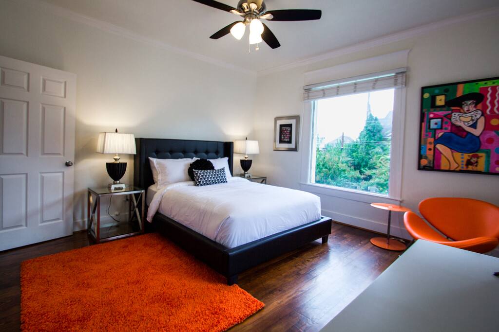 Queen pillow top mattress with plush linens and pillows.