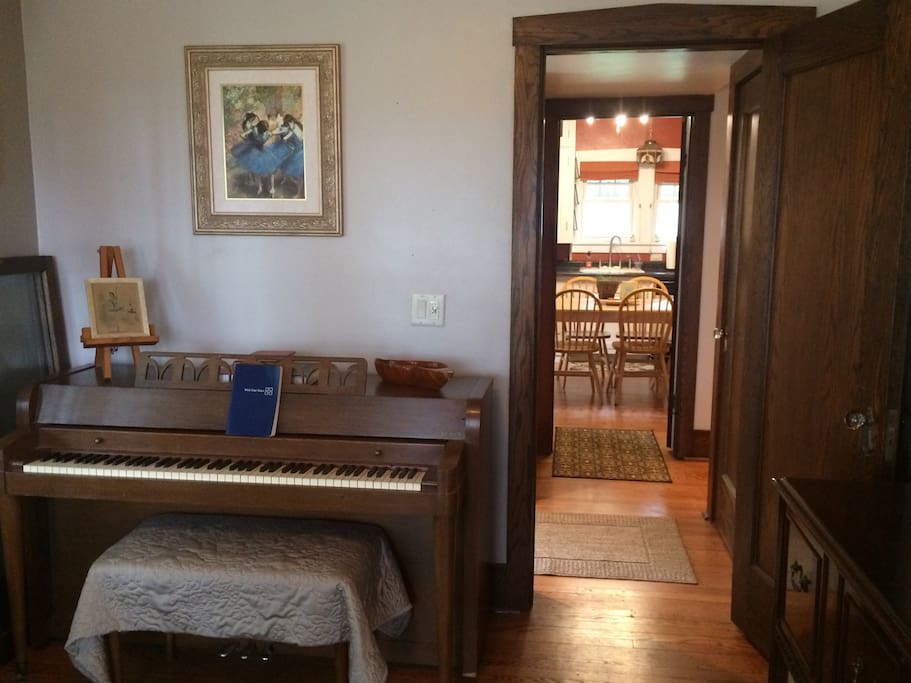 Music Room near back entrance of house. Feel free to play the piano, even though it may not be exactly in tune (but it's close).