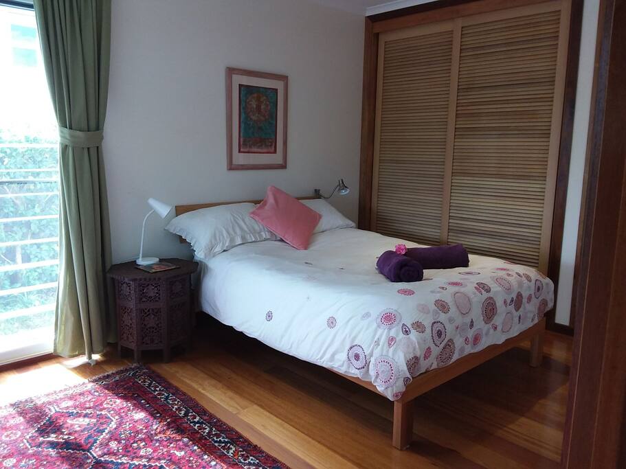 Double bed , morning sunlight water views