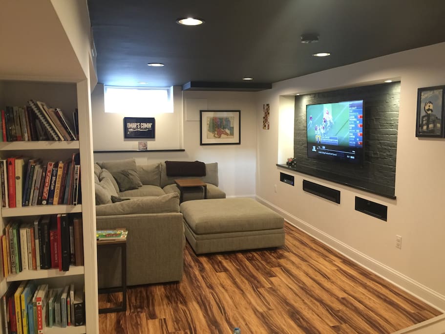 Finished basement with 9 foot ceiling - a rarity in this neighborhood - features built-in Vizio TV with apps and enormous comfy sectional couch (not for sleeping). This is the other gem of our home.