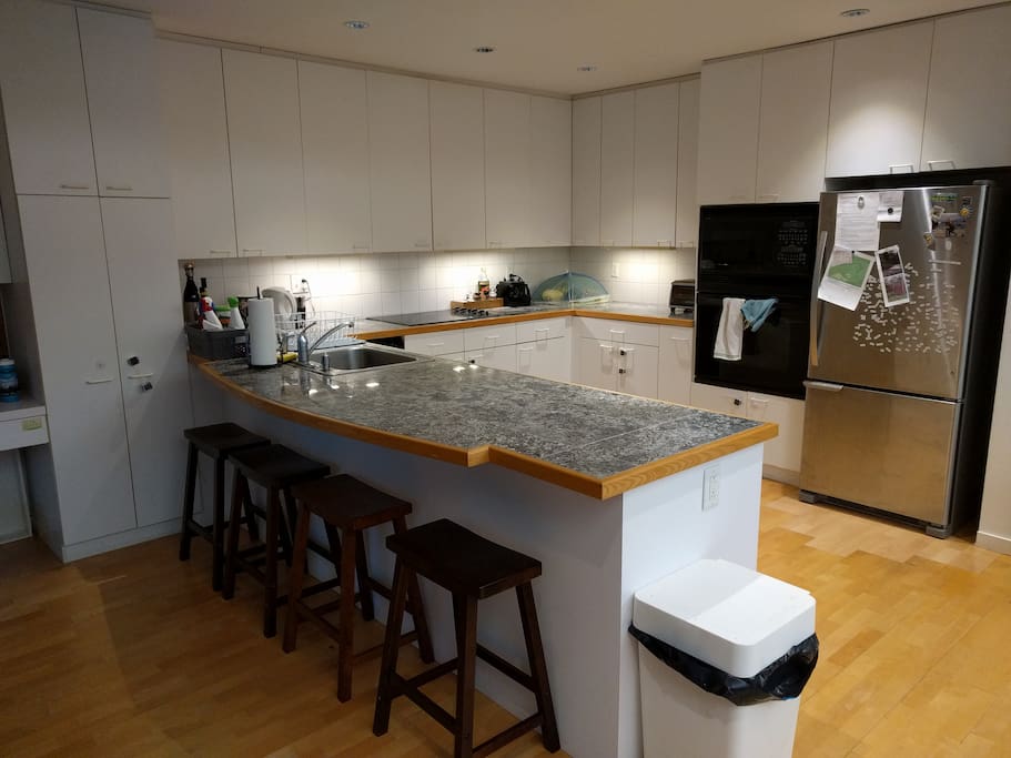 Kitchen with pots/pans/etc. Convection oven, dishwasher, microwave, refridgerator