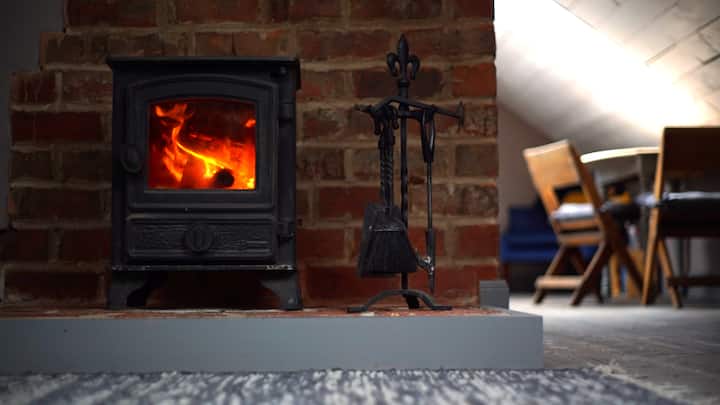 Wood burning stove (logs & instructions provided)