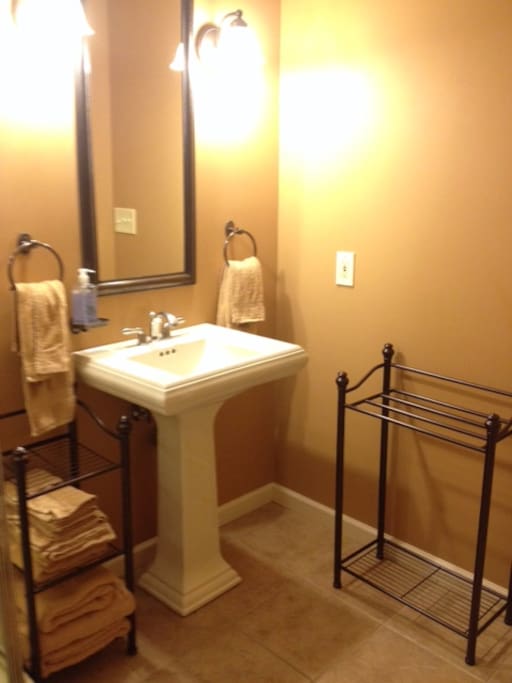 Bathroom sink- bathroom includes 6 sets of towels