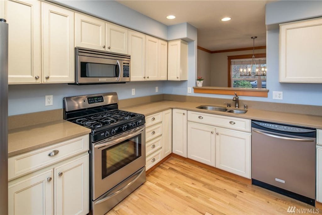 The kitchen is fully equipped and has all stainless appliances.