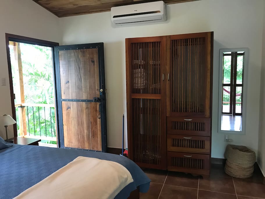 Large armoire for clothes with extra towels (beach and bath), sheets, a twin air mattress, coat hangers, etc.