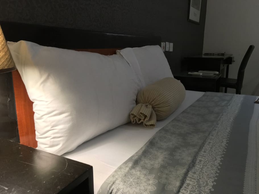 Standard double bed, work-desk with multiple international sockets for multiple devises charging, flat screen tv, cable tv, A/c and more
