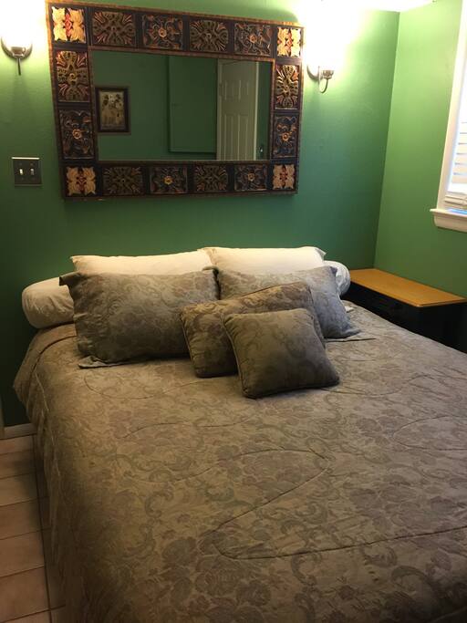 Comfortable real queen size bed in a private room.