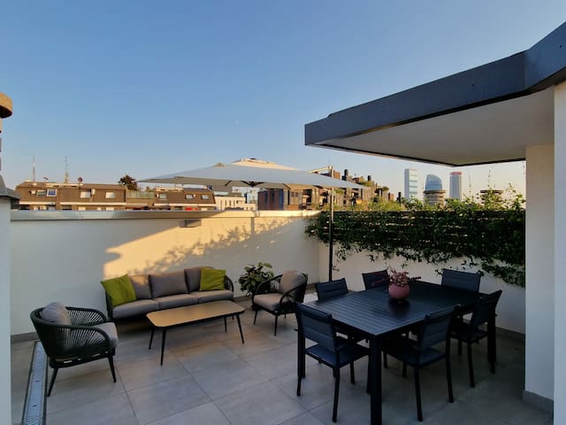 Attico con terrazzo panoramico con posto auto