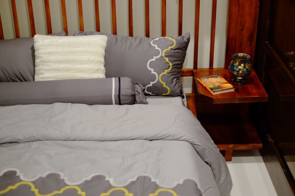 Bed with built in side table