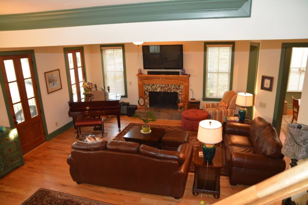 living room with 65 inch TV and g