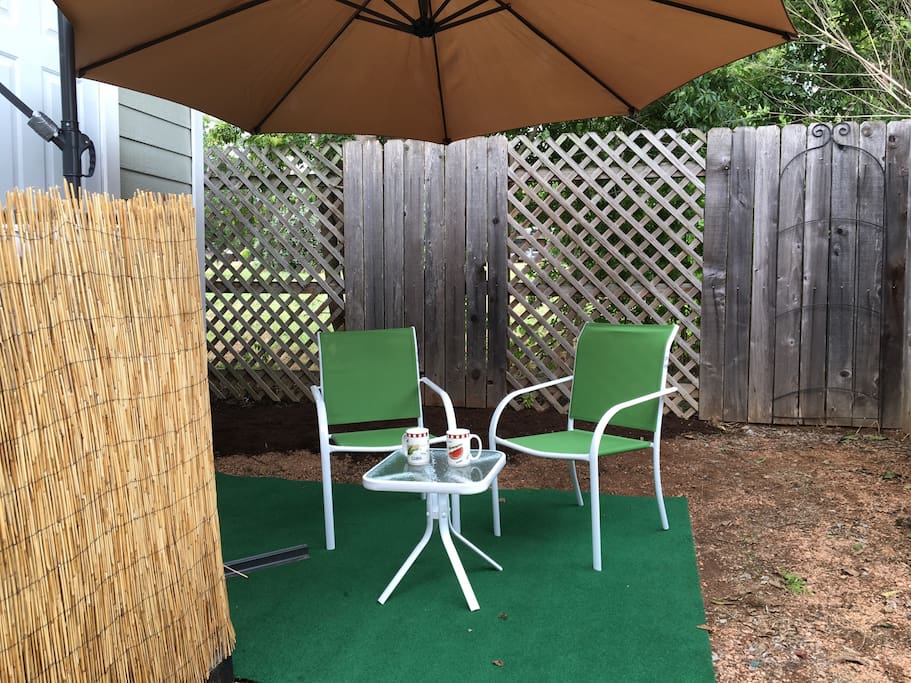 Quiet, shady, secret seating area behind the cottage.