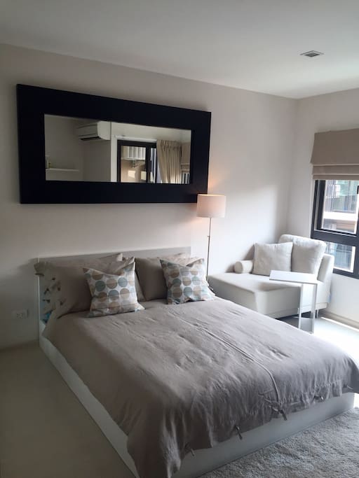 Top floor overlooking the central courtyard garden and pool area. Queen size bed.