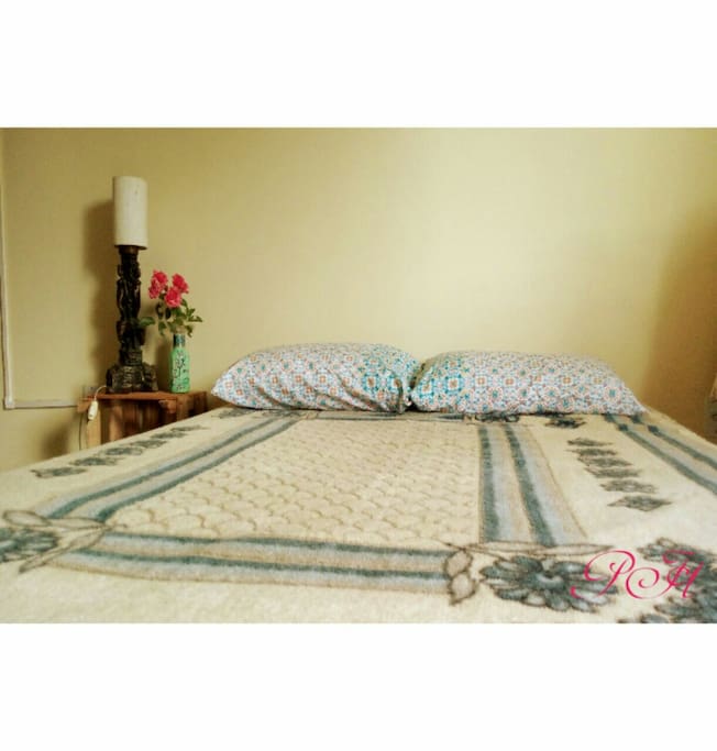 Cama da Suíte e detalhes