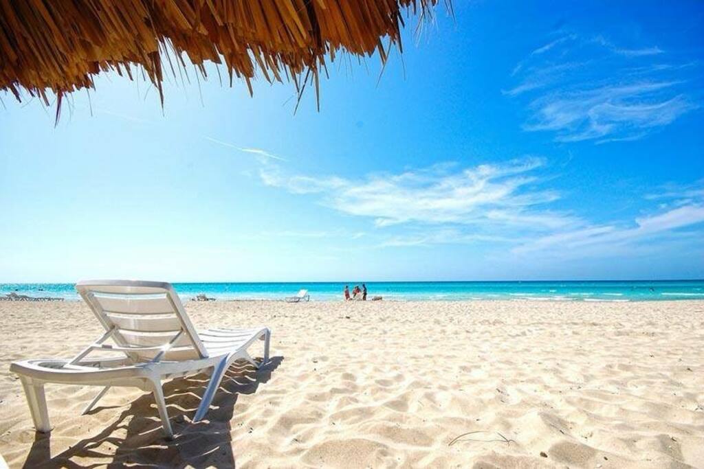 your private umbrella with beach chair