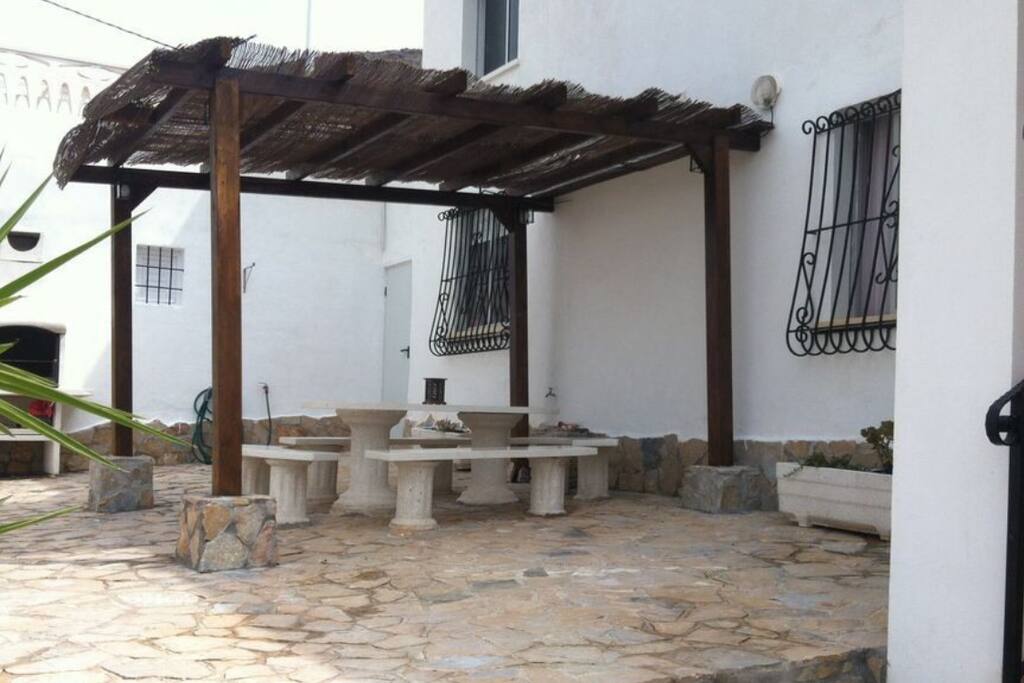 Front patio with seating and BBQ