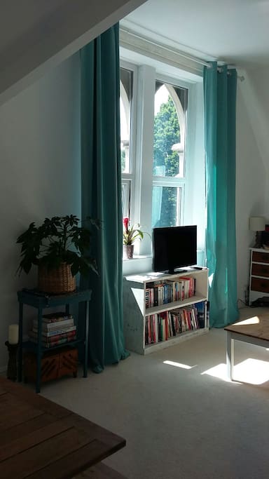 The Lounge is flooded with light through the arched windows