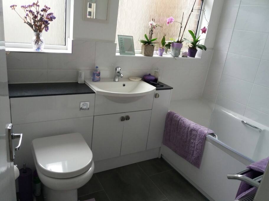 Private bathroom with bath & power shower.
