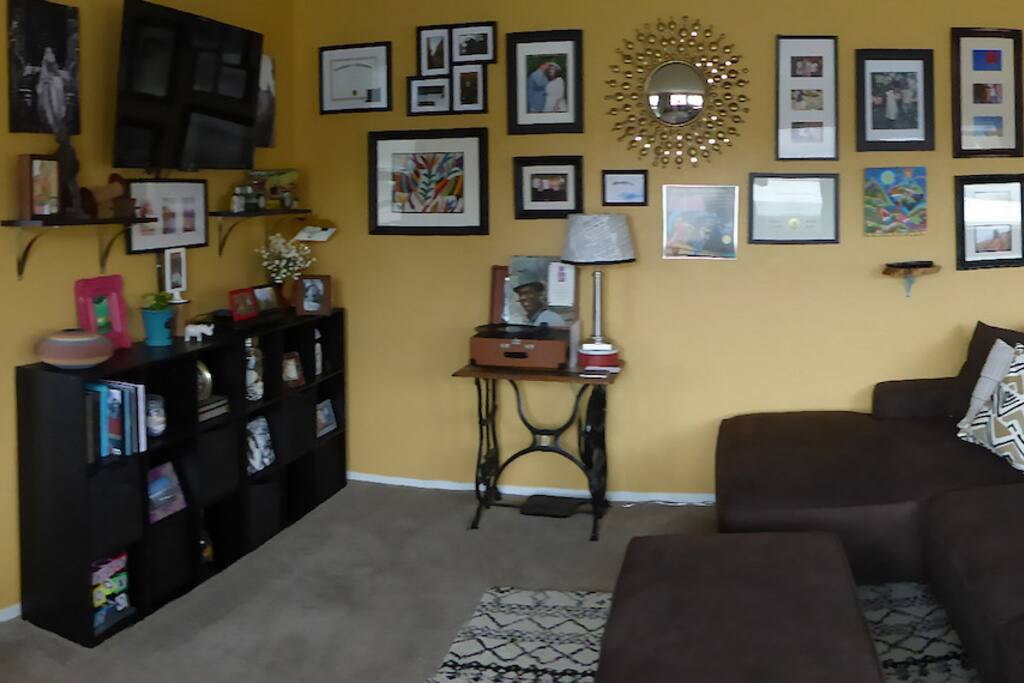 The living and dining areas are bright thanks to a wall of windows. At night, you can open them up and hear the sea lions from the harbor (1 block away).