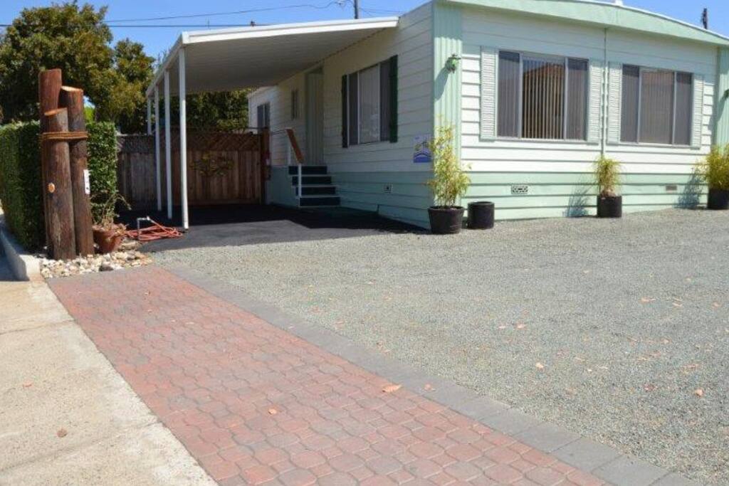 Front facing Morro Rock w/ covered parking and patio