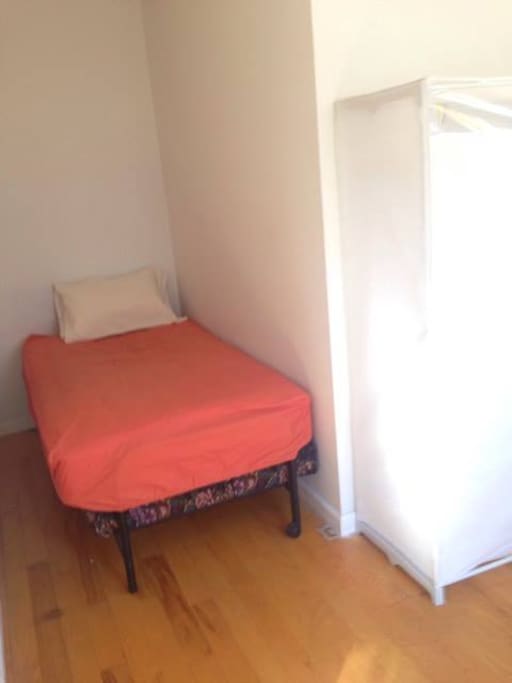 This comfortable single sized bed will hold 1 guest.