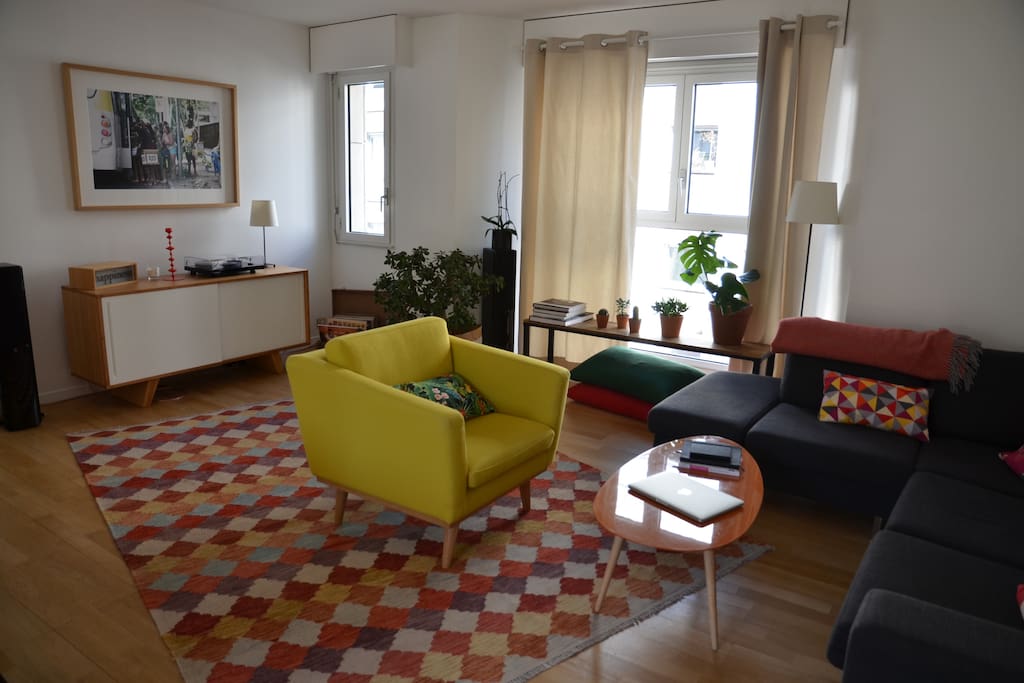 Our living room is really bright : it has a double exposure and comes with large windows on both sides