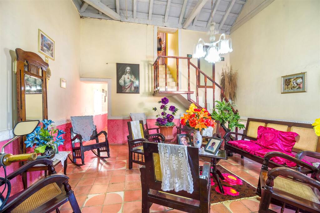 Entrance and living at the background right the access to bedroom 1