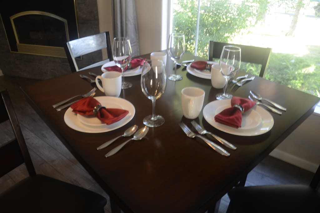Dining table set for four