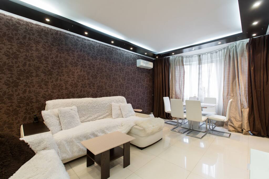 Room # 1 (the table is extendable and can accommodate up to 8 people)