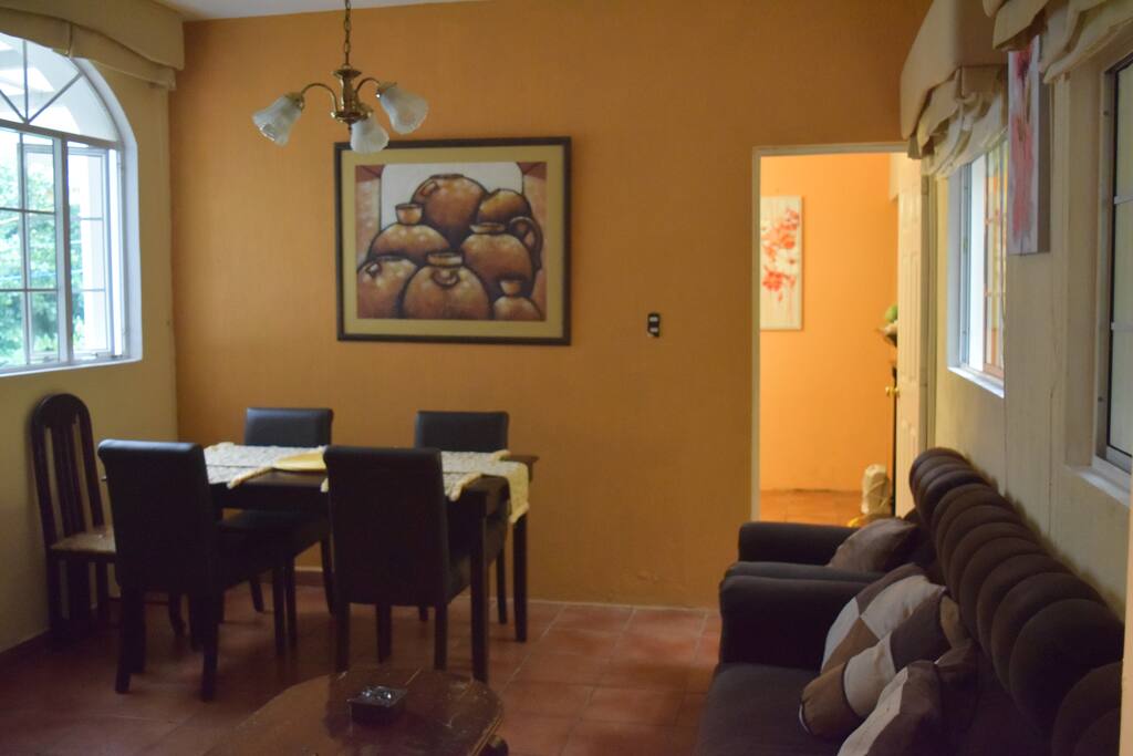 Dinning room, living room and entrance to first bedroom/Comedor, sala y entrada al primer cuarto