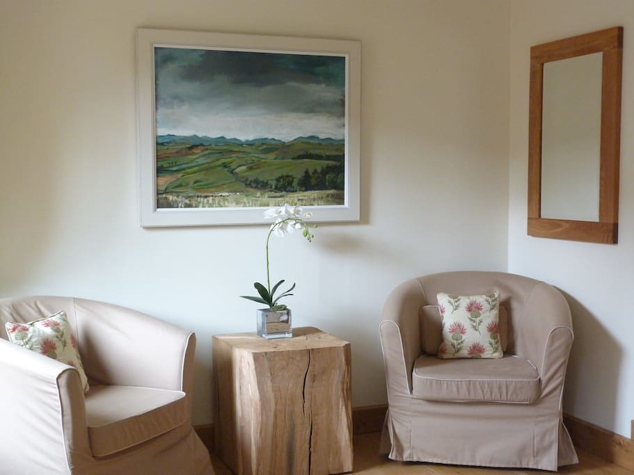 Oak room has an oak table and two comfortable chairs