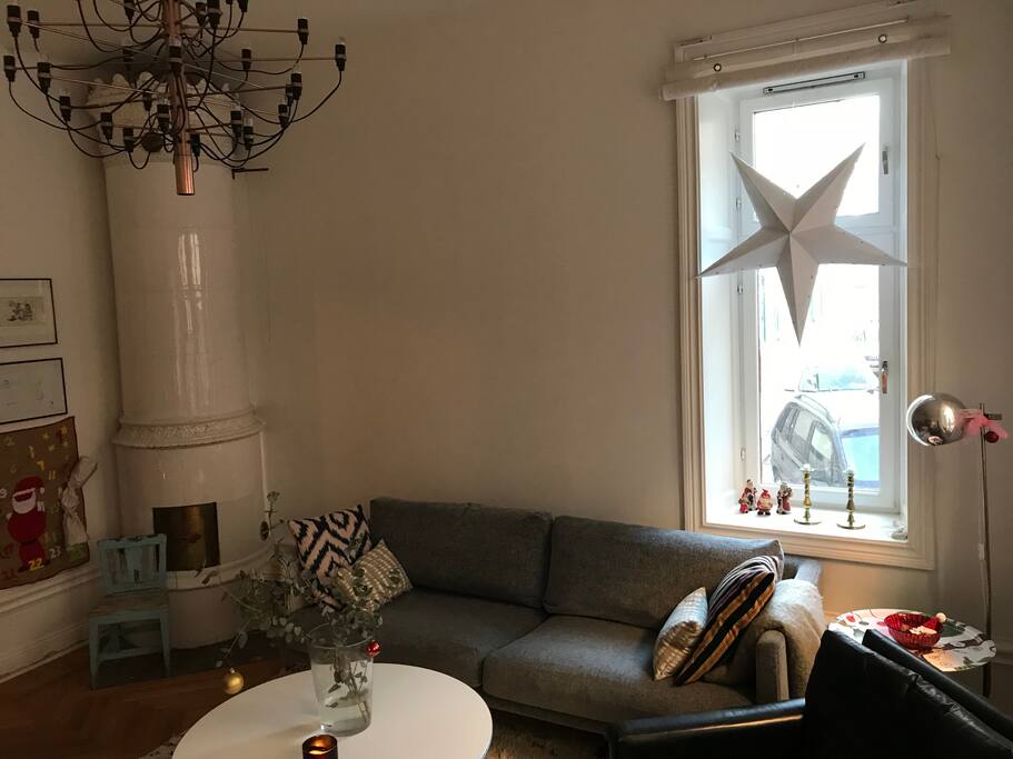 Livingroom with tiled stove ( unfortunately not functional)