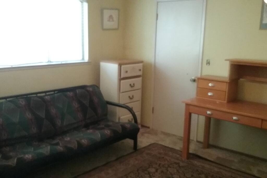 Futon/sofa provides additional sleeping space. Closet is walk-in
