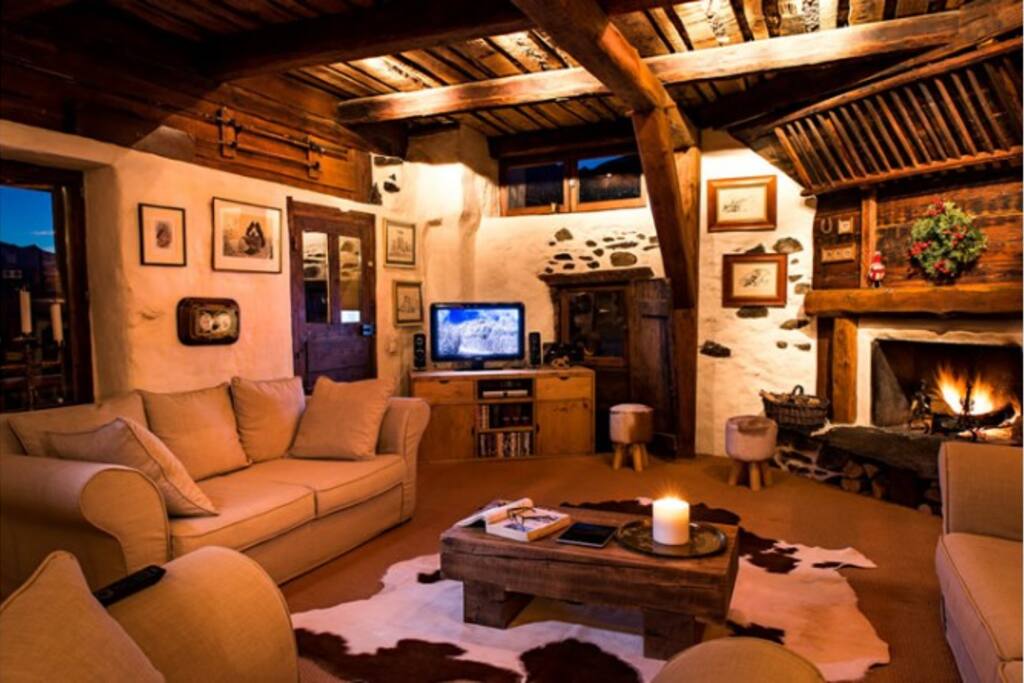 Large lounge with open fire and large balcony overlooking Briancon and the durance valley