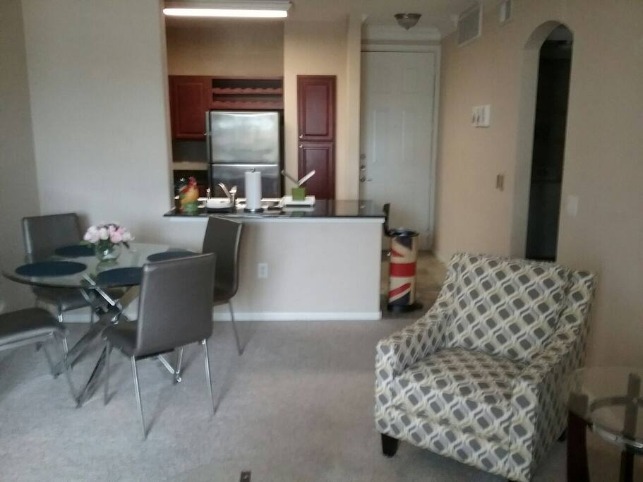 Kitchen opens up to living and dining area
