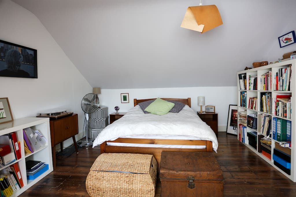 Comfortable double bed with wooden frame from Warren Evans