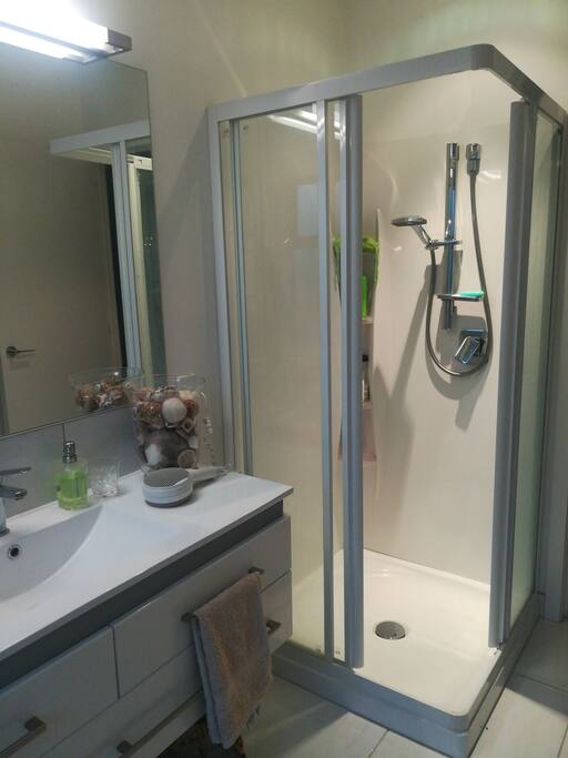 Private bathroom with bath and shower, separate private toilet.