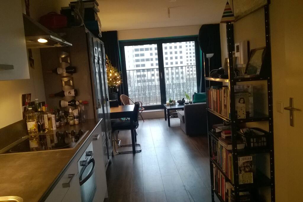 Kitchen with microwave/oven, dishwasher, washingmachine & dryer.