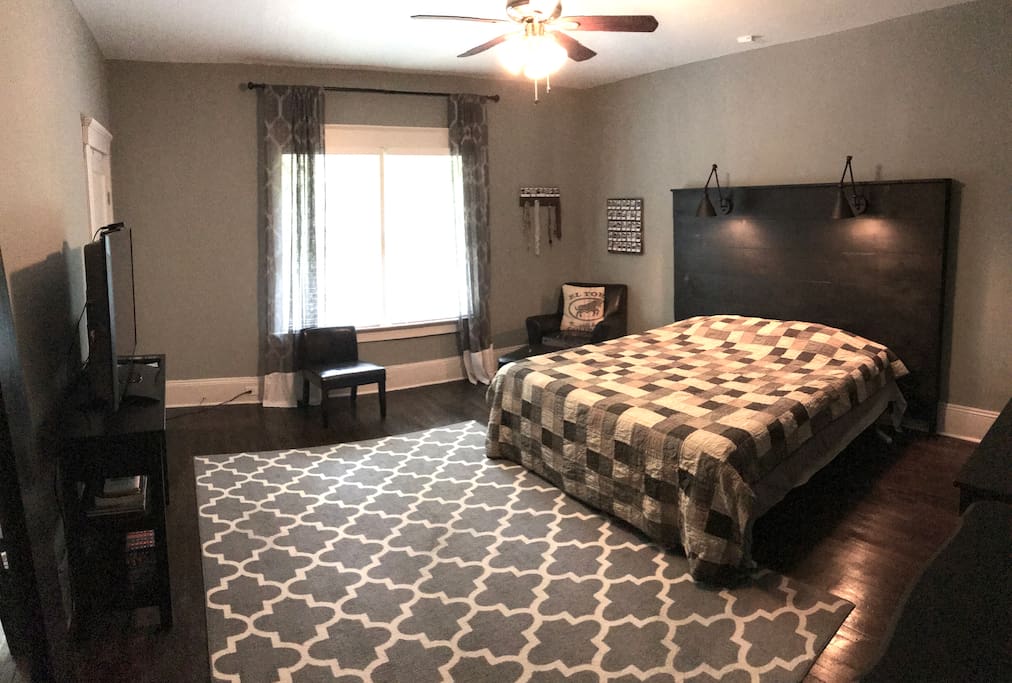 Master bedroom with King bed and TV