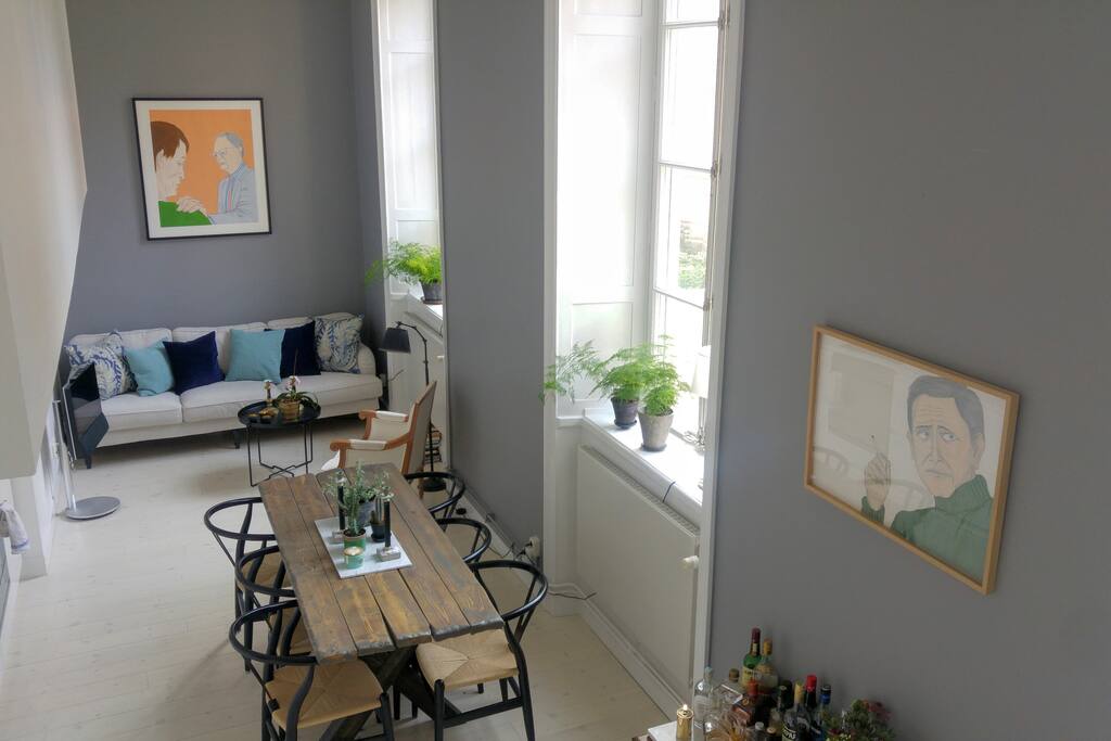 Kitchen and living room with huge windows overlooking the private garden