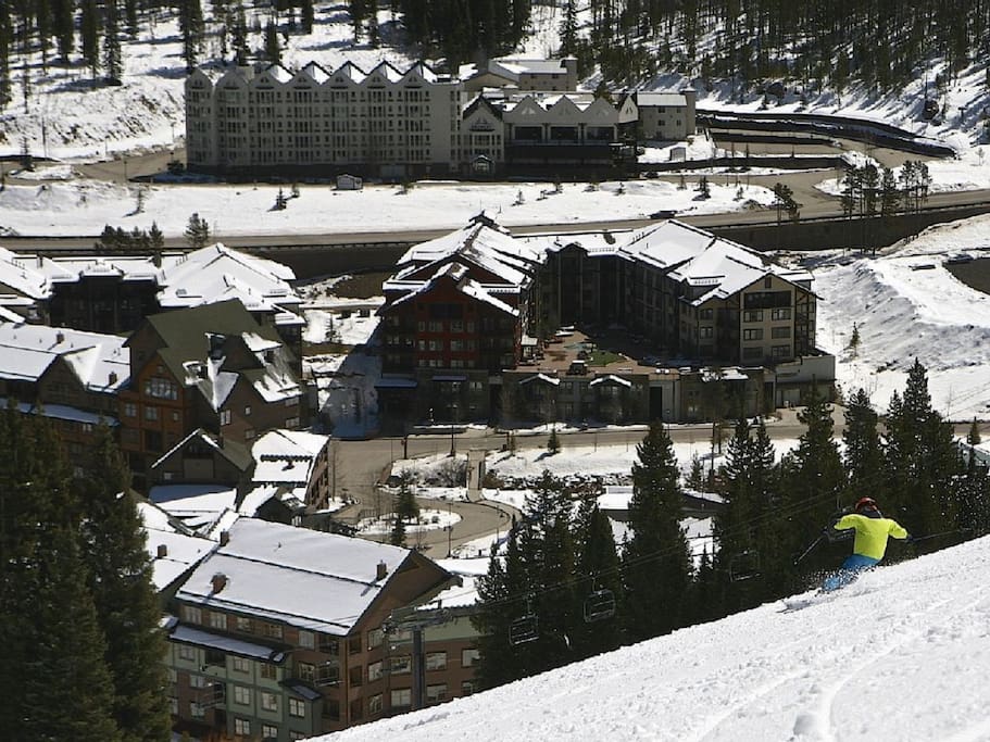 A slope view back to condo (horseshoe shaped bldg)