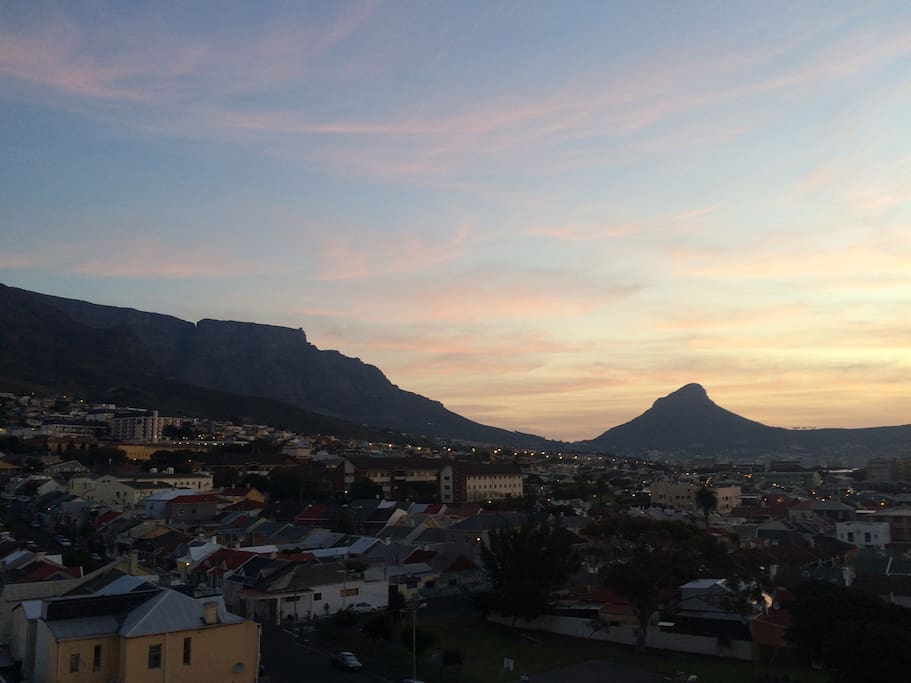 View of Lions Head, Table mountain and Woodstock from balcony.