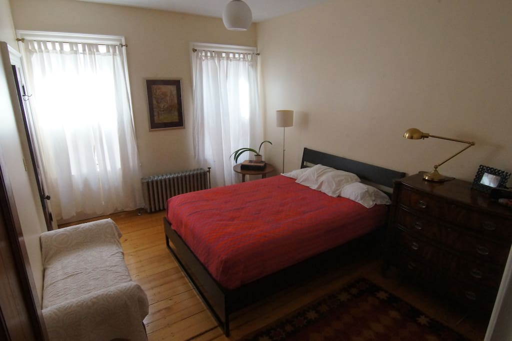 Bedroom with super comfortable queen sized bed.