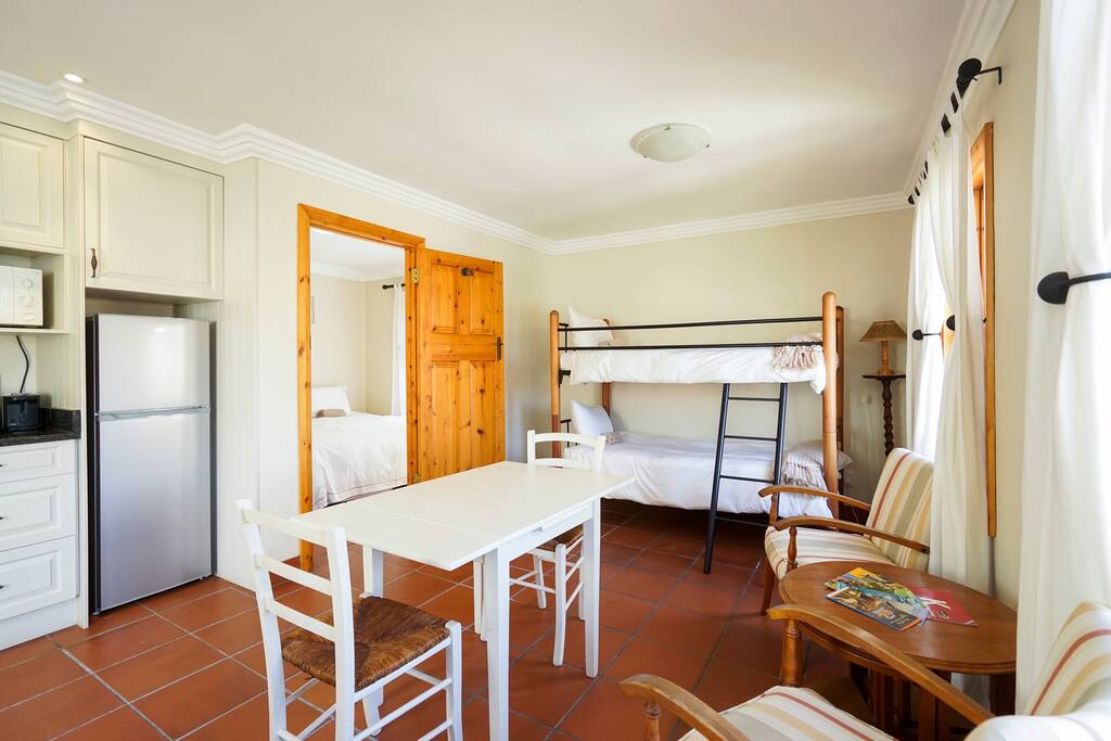 View of common area with entrance into main bedroom