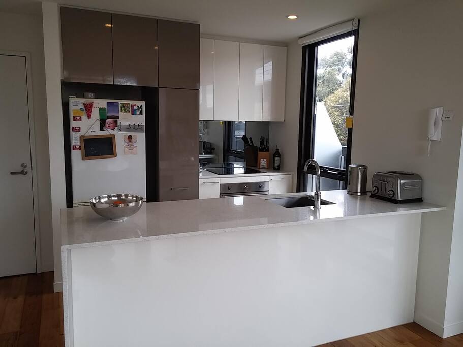 Clean, large kitchen with all the appliances and utensils you could need. Storage space for your food too.