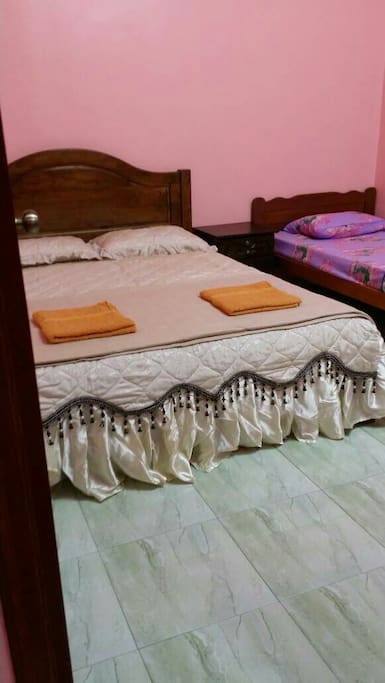 Master Bedroom - 1 Queen + 1 Single Bed.