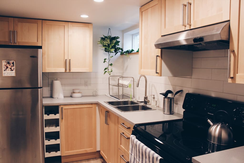 The kitchen is stocked with all your kitchen necessities, including complimentary tea, coffee, and light breakfast options.