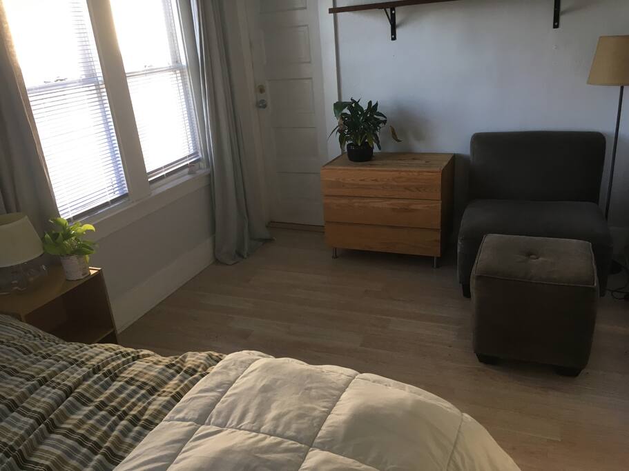 View from the bed. The door leads to the bathroom.