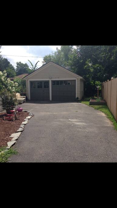 Private driveway and 1 car garage with storage space