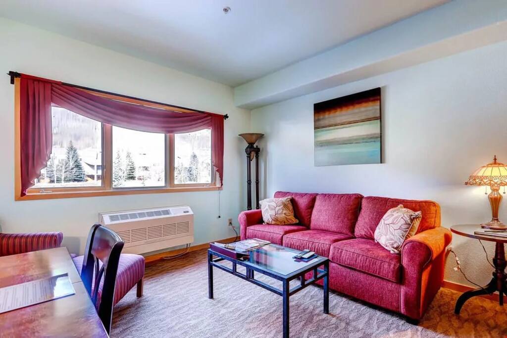 Sink into the plush sofa after a long day exploring the mountain.
