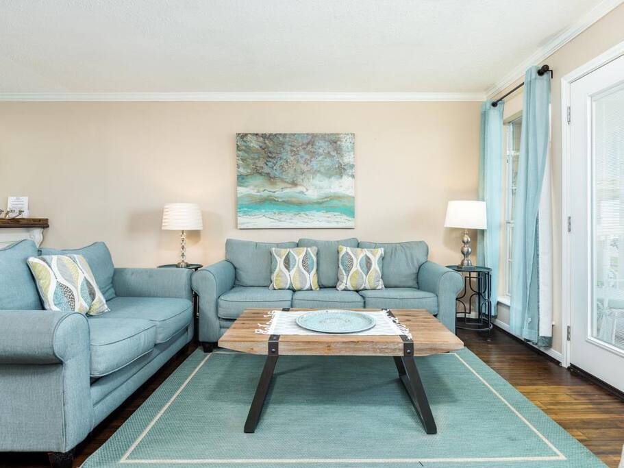 Updated furnishing include Queen Sleeper Sofa and matching loveseat.